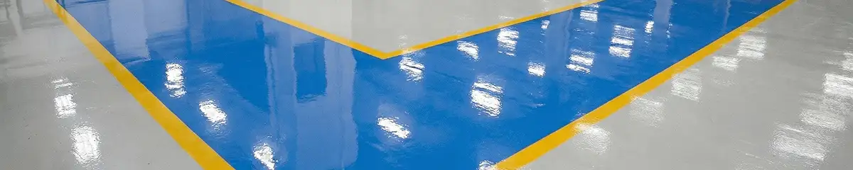 A factory floor professionally covered and marked with epoxy flooring in Los Angeles, CA