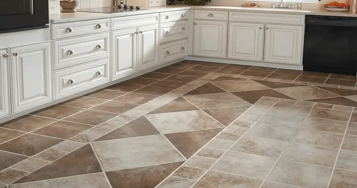 Kitchen with white cabinets and a professionally installed tile floor in Los Angeles, CA