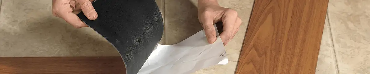 A professional installing vinyl flooring in Los Angeles, CA